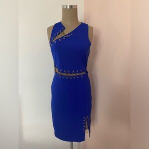 Blue dress with cutouts and gold chain details
